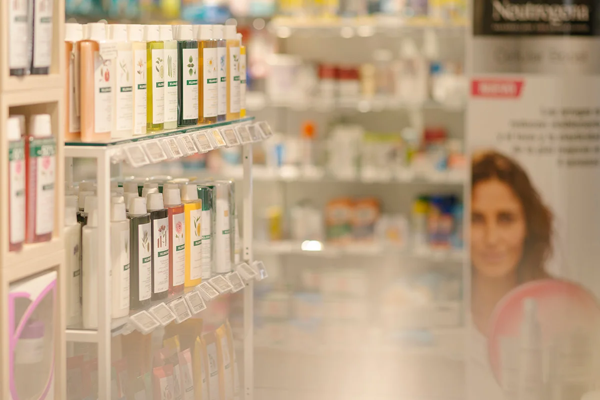 Personal care and skincare products displayed on retail store shelves with natural ingredient labels
